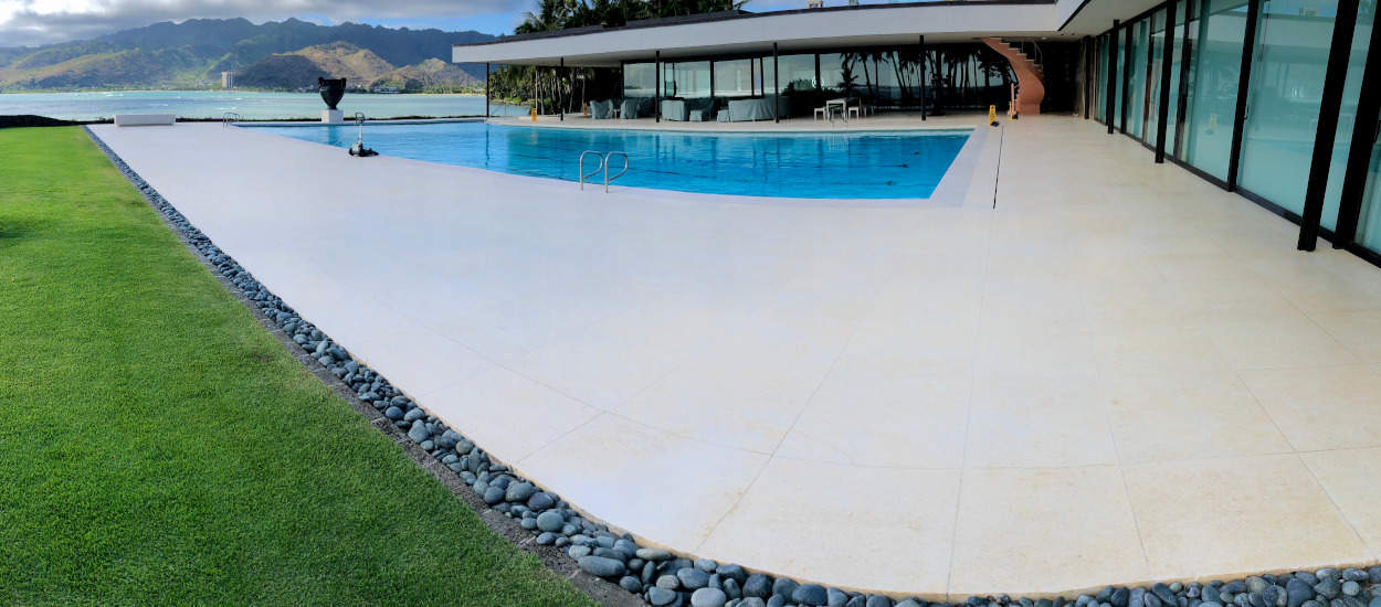 completed limestone pool deck and restored marble pool